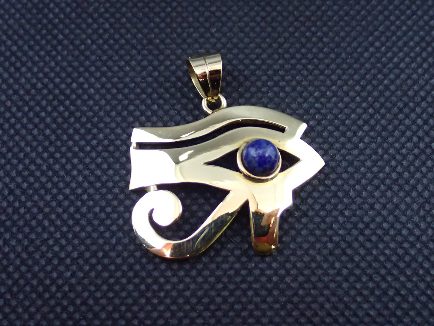 Pendentif oeil de ra en or jaune 750/ème de 7.80g, lapis lazuli/ Bijoux d'occasion