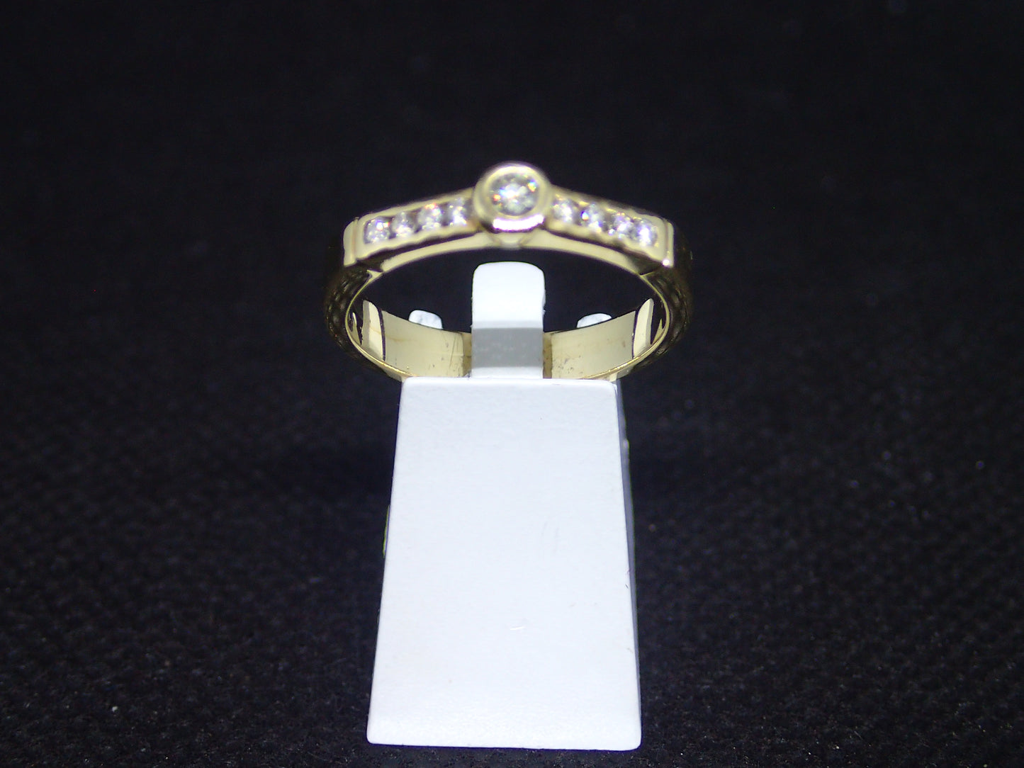 Solitaire accompagné en or jaune 750/ème de 3.90g, diamant / Bijoux d'occasion