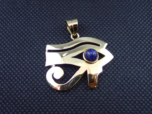 Pendentif oeil de ra en or jaune 750/ème de 7.80g, lapis lazuli/ Bijoux d'occasion