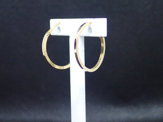 Créole ciselée en or jaune 750/ème de 0.98g / Bijoux d'occasion