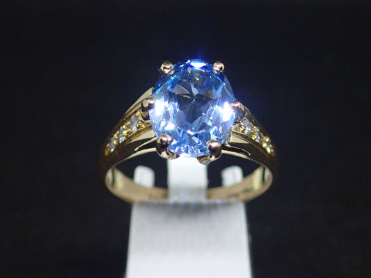 Bague en or jaune 750/ème de 4.18g, topaze, diamant / Bijou d'occasion
