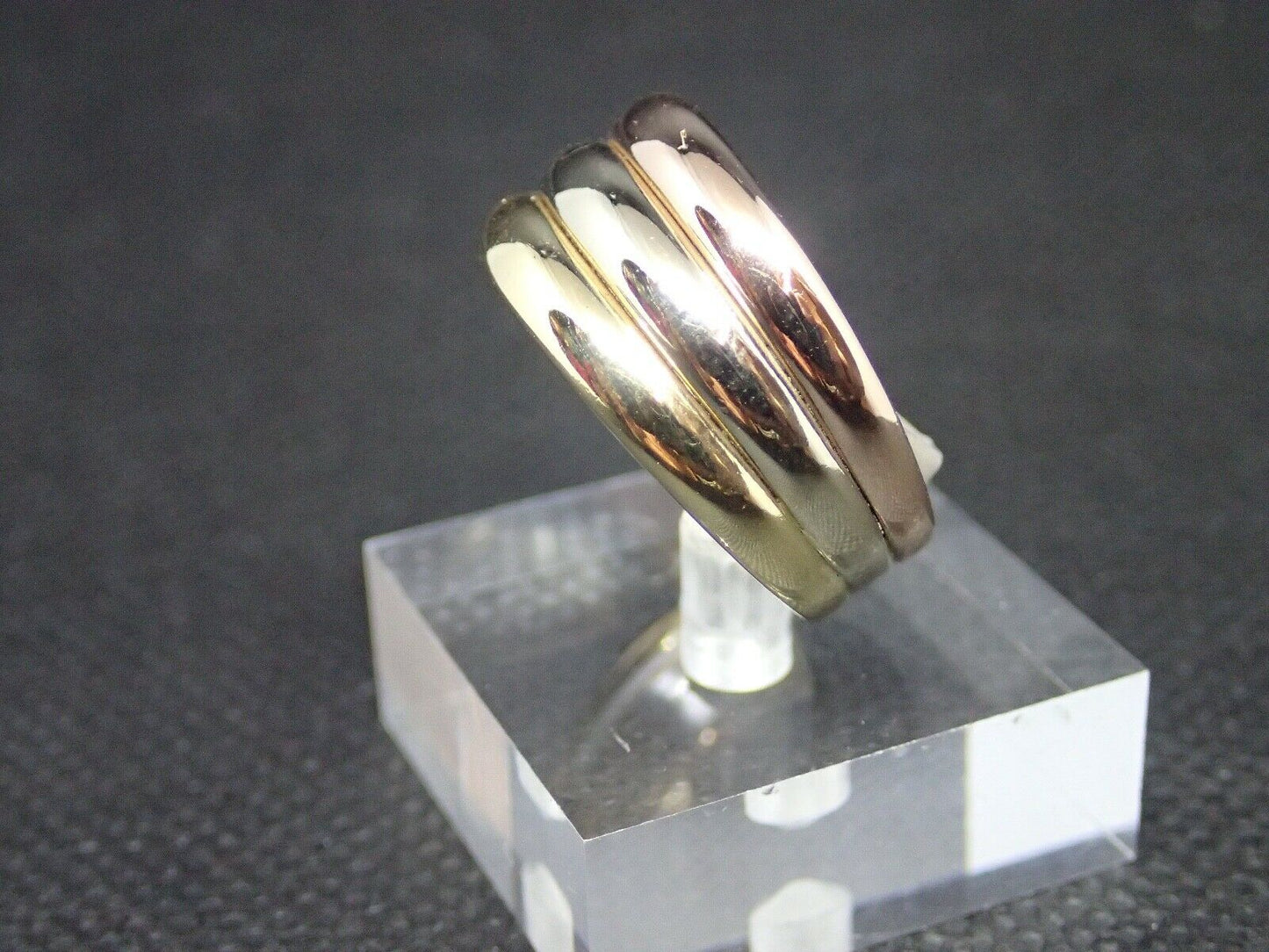 Bague tricolore or 750/ème de 4.54g. Largeur de 10.4mm, T60 / Bijoux d'occasion